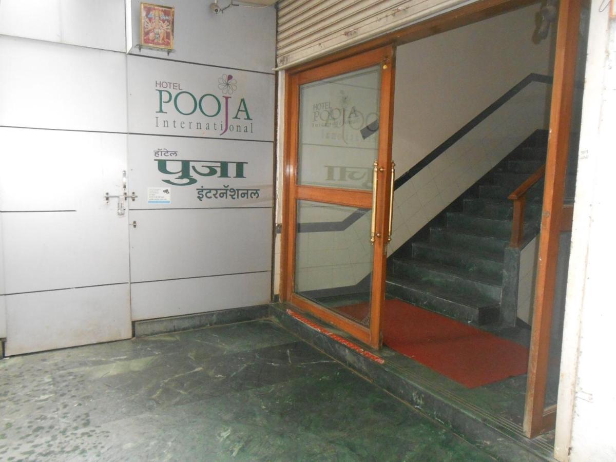 فندق Pooja International ناسيك المظهر الخارجي الصورة